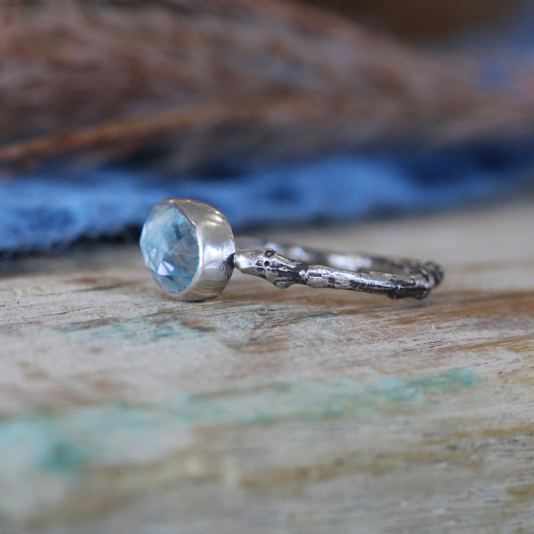 Wanderer Ring blue Topaz and sterling silver cast branch