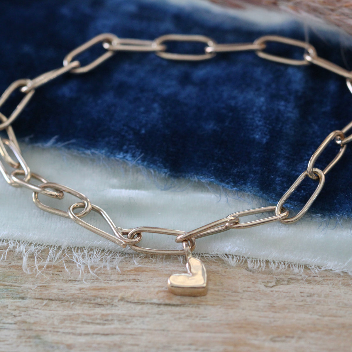 14k gold Heart charm on handmade paper clip chain bracelet